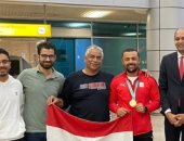 عزمى محيلبة يصل إلى القاهرة بعد ذهبية بطولة العالم للرماية