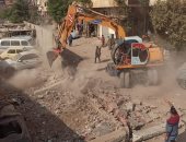 الجيزة تزيل التعديات والجراجات المخالفة بشارع المكرونة بالعمرانية.. صور