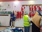 تنظيم معرض لتوزيع الملابس الجديدة بالمجان على الطلاب غير القادرين بمدارس المحلة