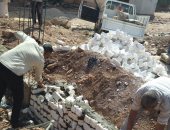 إزالة تعديات على أملاك الدولة بمساحة 2150 م2 بحى الصداقة فى أسوان