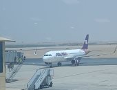مطار سفنكس يستقبل رحلة قادمة من جدة على متنها 155 راكبا.. صور