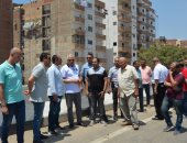 محافظ الجيزة يعاين عدداً من نماذج طلاء العقارات بالطريق الدائري بالطالبية