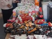 "تموين الإسكندرية" تضبط مخزنا بدون ترخيص يحتوى على مواد غذائية منتهية الصلاحية