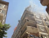 السيطرة على حريق أعلى عمارة سكنية بمنطقة الزهراء فى سوهاج.. صور