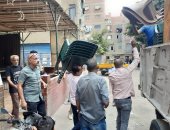 تشميع مقهى مخالف بالمنيرة ورفع تعديات وإشغالات سوق عشوائى ببولاق