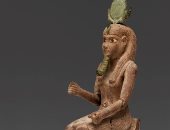 تمثال مصرى لـ أوزوريس مصنوع من الخشب يعرض فى أحد المزادات العالمية