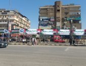 علم فلسطين ولافتات مصر وفلسطين إيد واحدة تزين ميدان الحصرى بأكتوبر