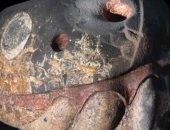 زلزال فى المكسيك يكشف عن قطعة أثرية على شكل رأس ثعبان