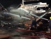 "النيابة" تُعاين مكان الحريق بميناء الصيد في بورسعيد للوقوف على الأسباب