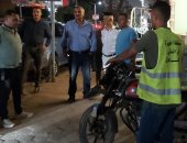 رفع 243 حالة إشغال وتحرير غرامات لدراجات نارية مخالفة خلال حملة بالدقى