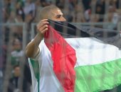 علم فلسطين يزين احتفال سليمانى بصدارة هدافى تصفيات كأس العالم عبر التاريخ