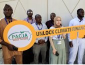 نشطاء يحتجون على صناعة الوقود الأحفوري في قمة المناخ  COP28