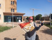 ناخبات يرتدين حجابا بعلم مصر بلجنة مدرسة مدينتى: بنشارك علشان استقرار مصر