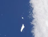 رائد فضاء يلتقط صورا لجبال جليدية على الأرض ويحذر من تغير المناخ.. صور