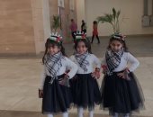 الأطفال يدعمون القضية الفلسطينية بالشال والعلم فى معرض القاهرة للكتاب