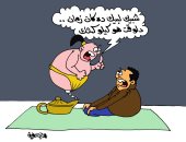 كحك العيد والمصباح السحرى فى كاريكاتير اليوم السابع