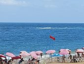 رفع الراية الحمراء على شواطئ الإسكندرية أول أيام العيد: احذروا المنخفض الأوروبى