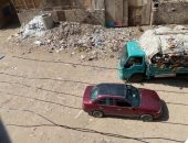 محافظة الجيزة ترفع مخلفات القمامة من شارع عادل إمام بالطالبية استجابة للمواطنين