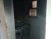 إخماد حريق داخل شقة سكنية فى العمرانية دون إصابات.. صور