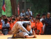 طفلة صينية 9 سنوات تبهر الجمهور فى دورة ألعاب عالمية للكونغ فو.. فيديو