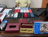 جمارك مطار سوهاج تُحبط محاولة تهريب 23 هاتف محمول