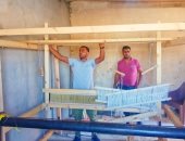 تسليم أنوال صناعة الكليم اليدوى وتوفير الأسمدة فى مركز نخل بوسط سيناء