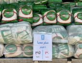 سوق اليوم الواحد بشارع مترو الساقية فى العمرانية يطرح كيلو السكر بـ30 جنيها