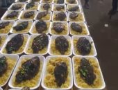 مائدة المحبة بكفر الشيخ.. مسلمون ومسيحيون يجتمعون على وجبة إفطار سمك وأرز.. فيديو