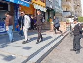 حى البساتين يشن حملة مكبرة لتنفيذ قرارات غلق وتشميع محلات بدون ترخيص.. صور