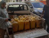 ضبط زيت طعام مجهول المصدر خلال حملة تموينية فى الهرم
