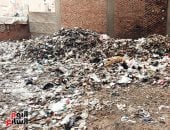 مأساة فى حى العجوزة.. سكان شارع بأرض اللواء يستغيثون بالتنمية المحلية.. فيديو وصور