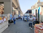 سوق اليوم الواحد بإمبابة يوفر احتياجات المواطنين من السلع الأساسية واللحوم.. صور