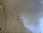 5 سيارات إطفاء تحاول إخماد حريق سنترال رمسيس بمنطقة وسط القاهرة.. صور