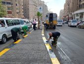 محافظة الجيزة تنفذ حملة نظافة وتجميل موسعة بشارع فيصل.. صور