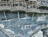 ميانهوا.. المكتبة الأكثر صعوبة فى الوصول محفورة بجانب جرف.. صور