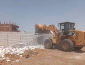 مدينة إسنا تزيل 24 حالة تعدى على أملاك الدولة بالموجة 27 لإزالة التعديات