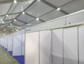 تجهيز معرض أهلًا مدارس فى حى إمبابة استعدادًا لافتتاحه.. صور