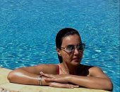 دينا فؤاد تتصدر محركات البحث والسبب صور فى حمام السباحة