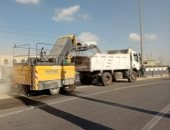 محافظ الجيزة تشن حملات نظافة موسعة فى الأحياء.. صور