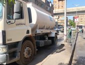 محافظة الجيزة تُطلق حملة نظافة وتجميل بشارع الوحدة فى إمبابة.. صور