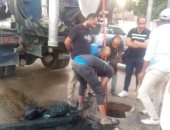 تطهير شبكات الصرف الصحى بأسوان على مدار 12 ساعة