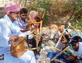 هوية وذاكرة النوبة.. أبناء الجنوب يعلمون الأطفال فن العزف على الطنبور
