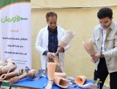 تسليم أجهزة تعويضية وكراسى متحركة للمرضى غير القادرين بأسوان