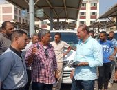 رئيس حى الهرم يتابع انتظام مواقف السرفيس والعمل بالتعريفة الجديدة.. صور