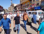 حملة لرفع إشغالات الباعة الجائلين على الطريق العام فى مدينة العياط.. صور