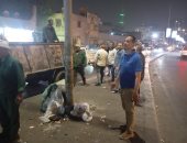 حملات ليلية فى إمبابة والوراق لضبط فريزة القمامة.. صور