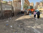حملات نظافة لرفع المخلفات أسفل محور عمرو بن العاص بفيصل ومواجهة النباشين.. صور