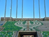 شعار النادي المصري يٌزين مدرجات الاستاد الجديد