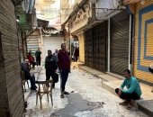 تجار سوق الخواجات بالمنصورة يغلقون محلاتهم حزنا على ضحايا حريق المول التجارى