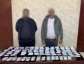 وزارة الداخلية تضبط شخصين يوزعان أموالا بمحيط لجان ملوى